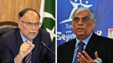 ahsan iqbal and pakistan olampic chief