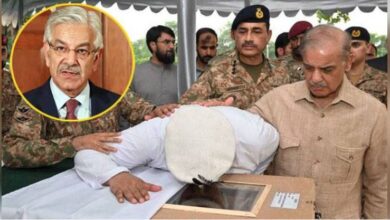 khawaja asif in Funeral of Captain Osama