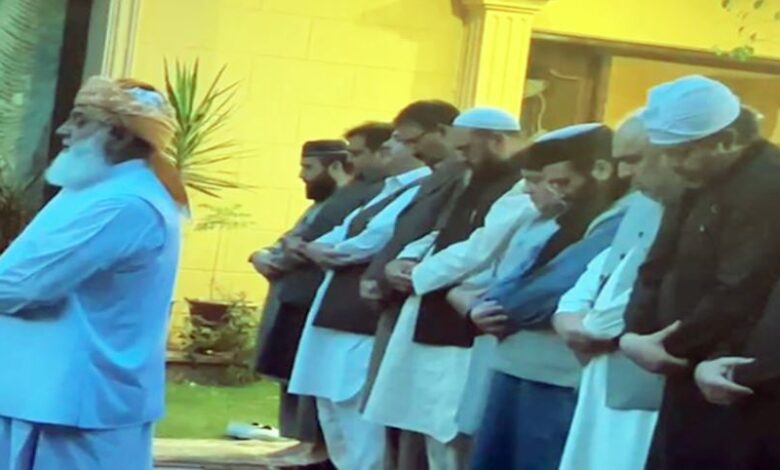 fazal ur rehman shake hand with pti