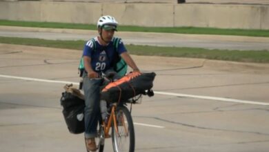 japanese student see football match on bicycle